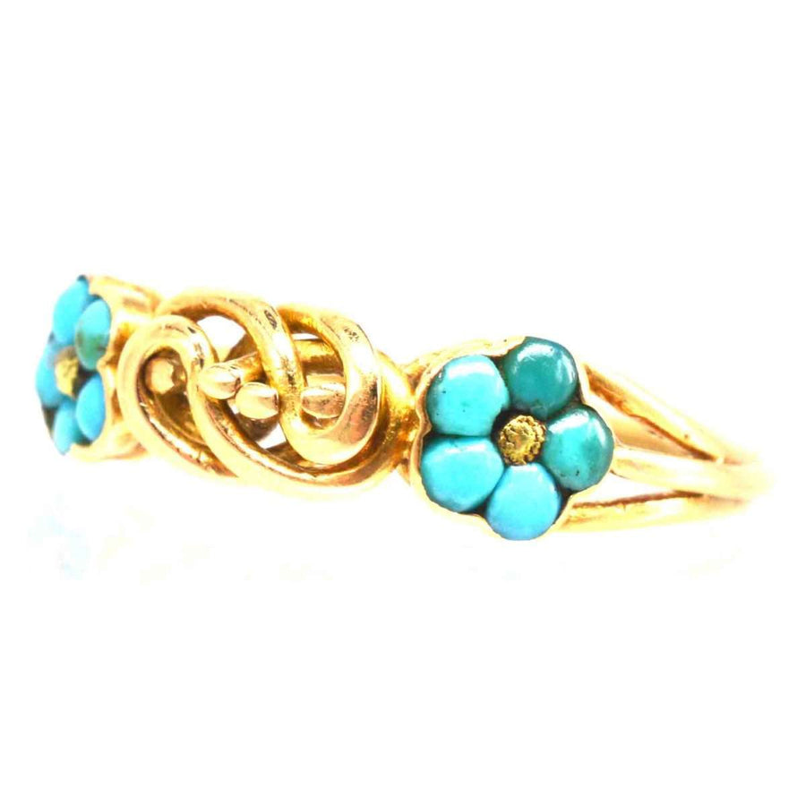 Knotenring aus 18-karätigem Regency-Gold mit Vergissmeinnicht-Blüten aus Türkis, die Liebe und Gedenken symbolisieren.