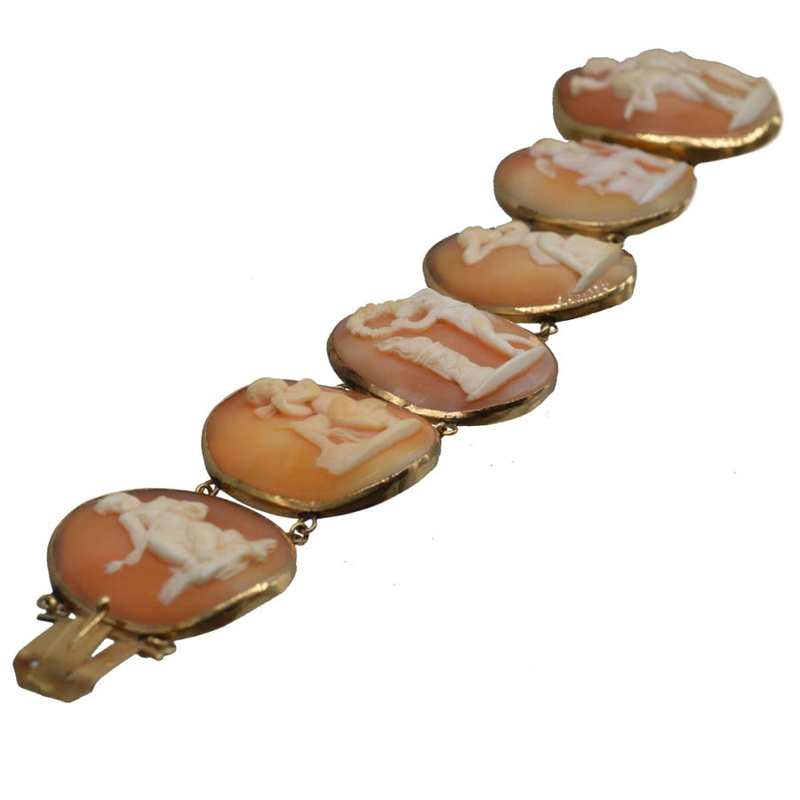 Regency 18ct gold bracelet with hand-carved shell cameos depicting Cupid in romantic scenes.