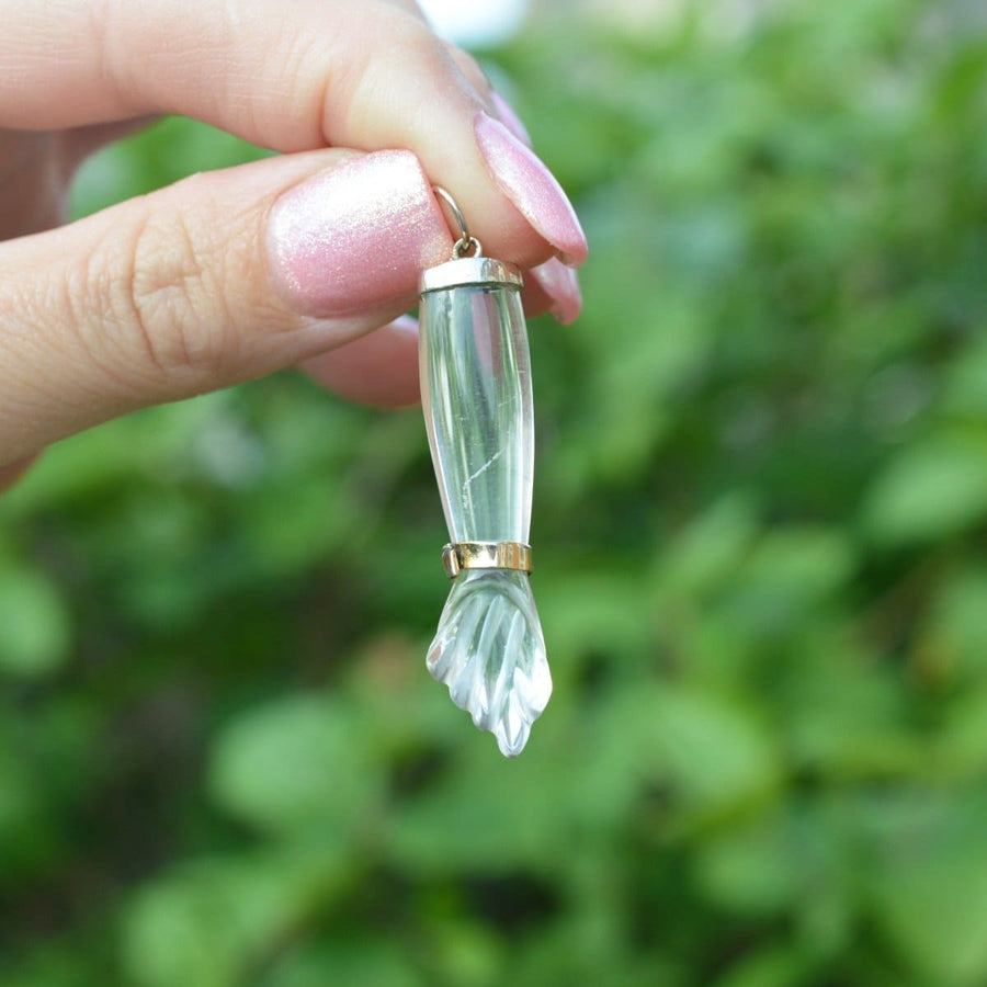 Victorian silver gilt mano figa hand pendant made of rock crystal, symbolizing fertility and protection.