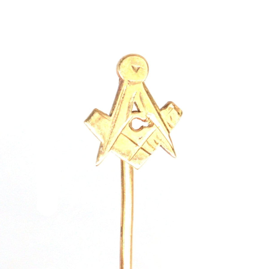 Vintage 9ct Gold Masonic Tie Pin featuring square and compass symbols, representing ideals of virtue and humanity.