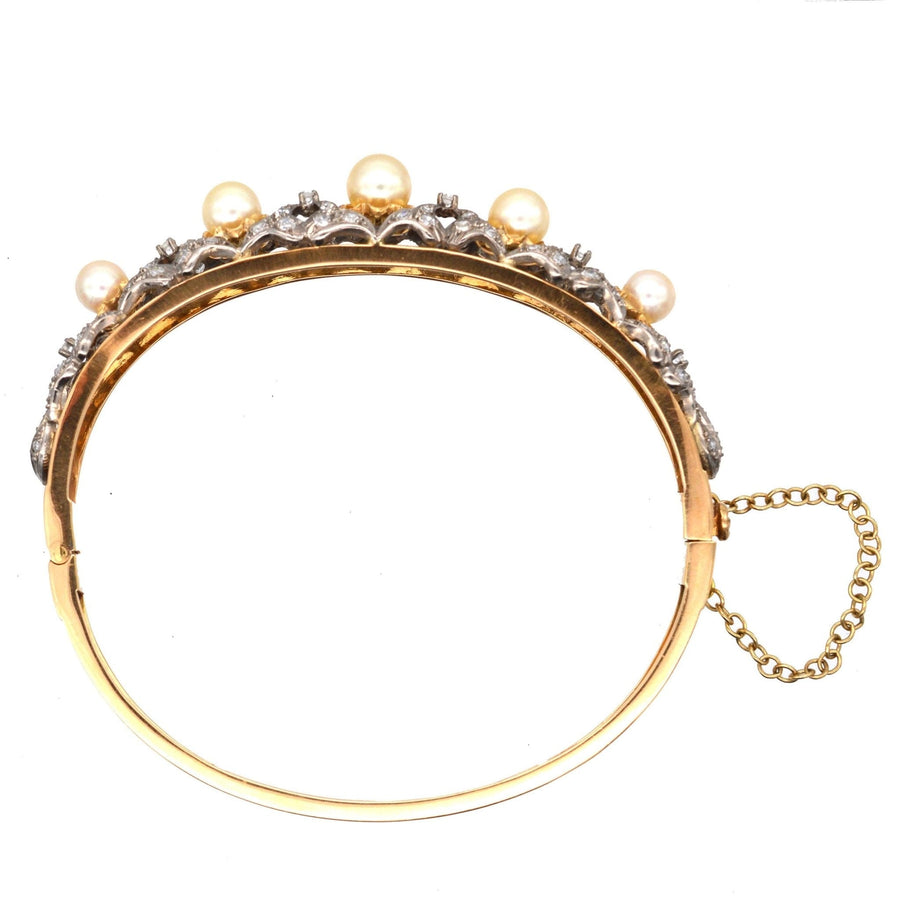 1940s 18ct gold bangle featuring large cultured pearls and diamond trellis-work, a stunning jewelry piece.
