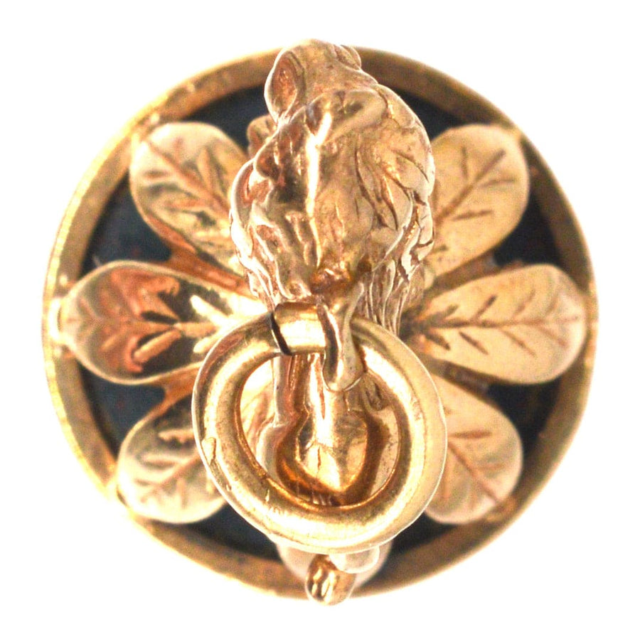 Anhänger aus 9 Karat Gold der 1940er Jahre mit einem Löwen auf einem Kranz und einem Blutsteinsiegel, Sammlerschmuck im Vintage-Stil.
