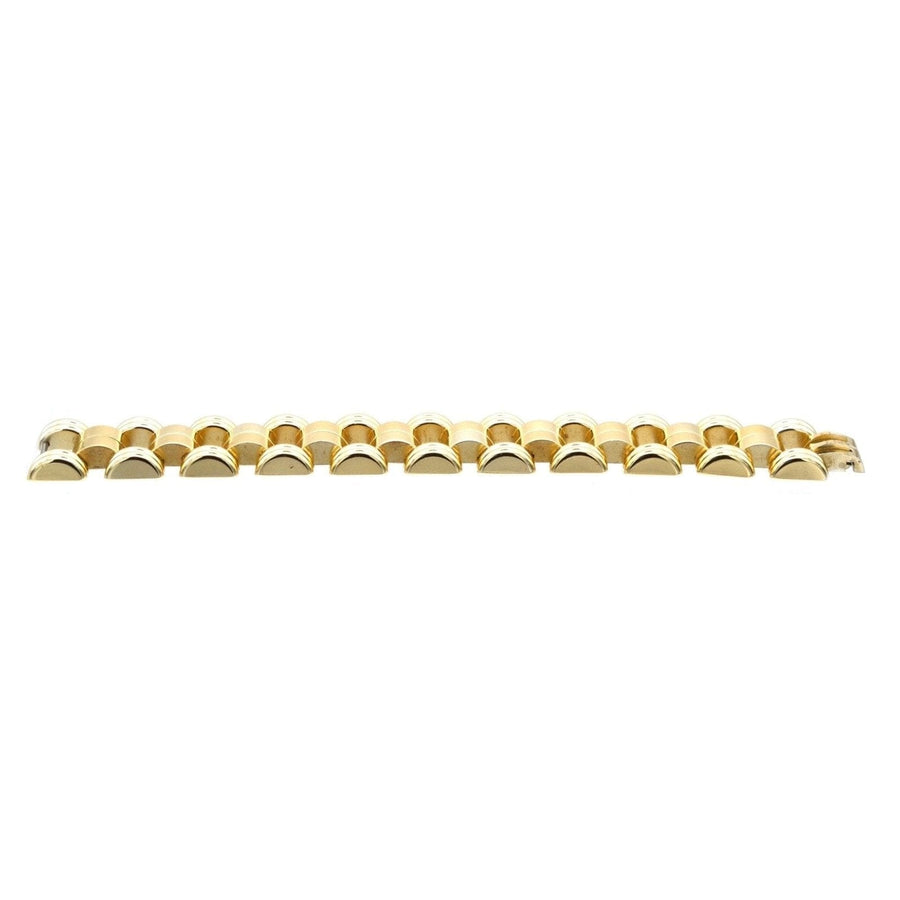 Französisches geometrisches goldfarbenes Panzerarmband aus den 1940er Jahren mit beweglichen Formen und Vintage-Design.