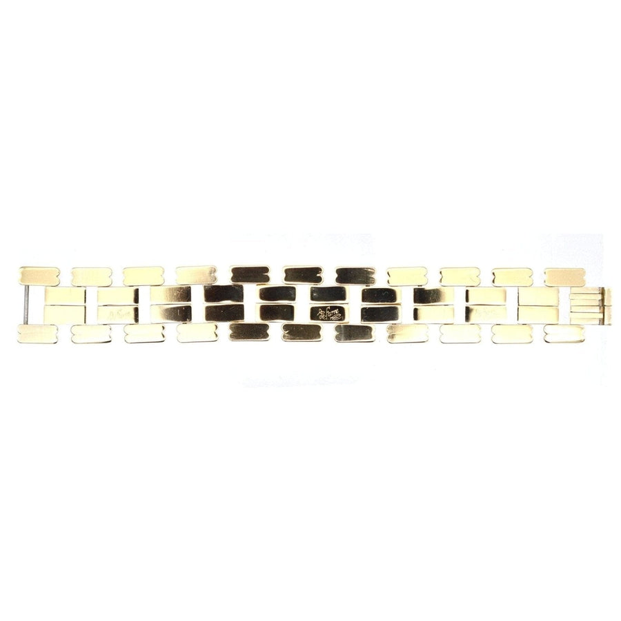 Französisches geometrisches goldfarbenes Panzerarmband aus den 1940er Jahren, signiert von de Farre, mit einem Retro-Design mit beweglichen Formen.