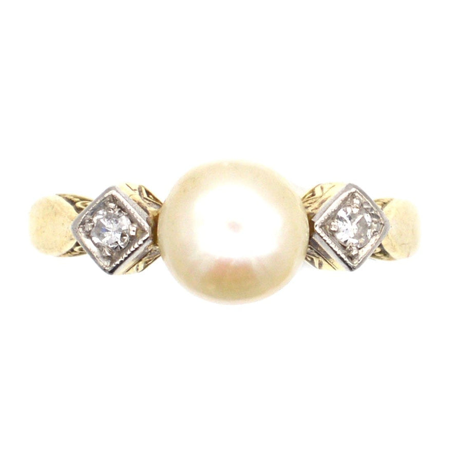 Art Deco Ring aus 14 Karat Gold mit einer Zuchtperle und Diamanten, perfekt für die Verlobung oder besondere Anlässe.