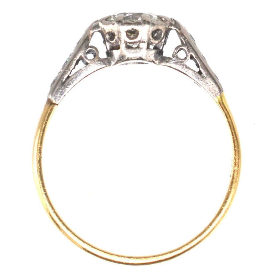 Solitärring aus 18-karätigem Gold und Platin mit Diamantschultern und einem Mittelstein von 3/4 Karat im Art-Deco-Stil.