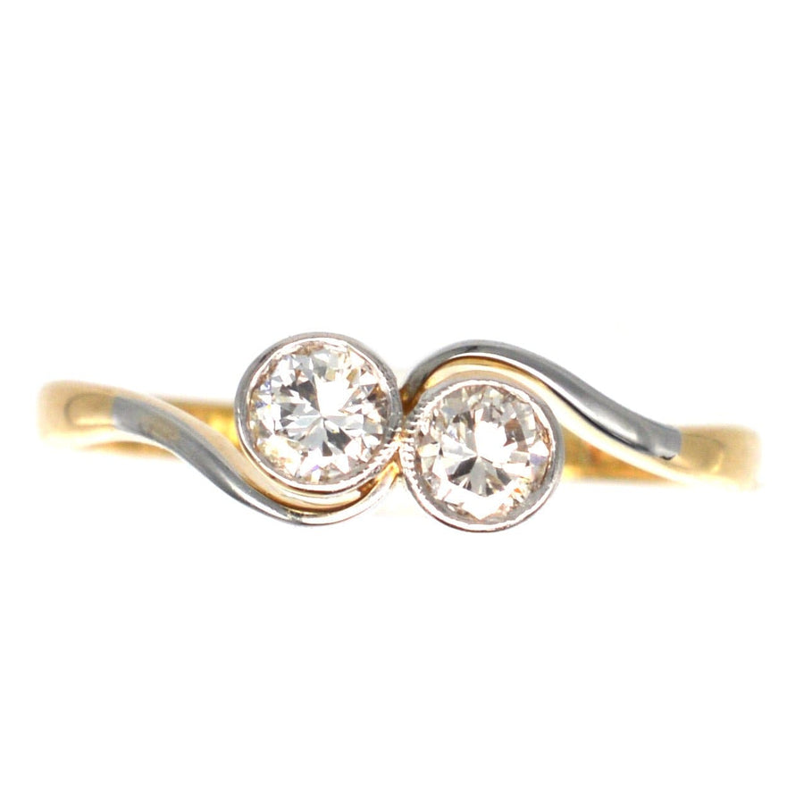 Art-Deco-Ring aus 18 Karat Gold und Platin 'Toi et Moi' mit zwei Diamanten, die die Liebe symbolisieren.