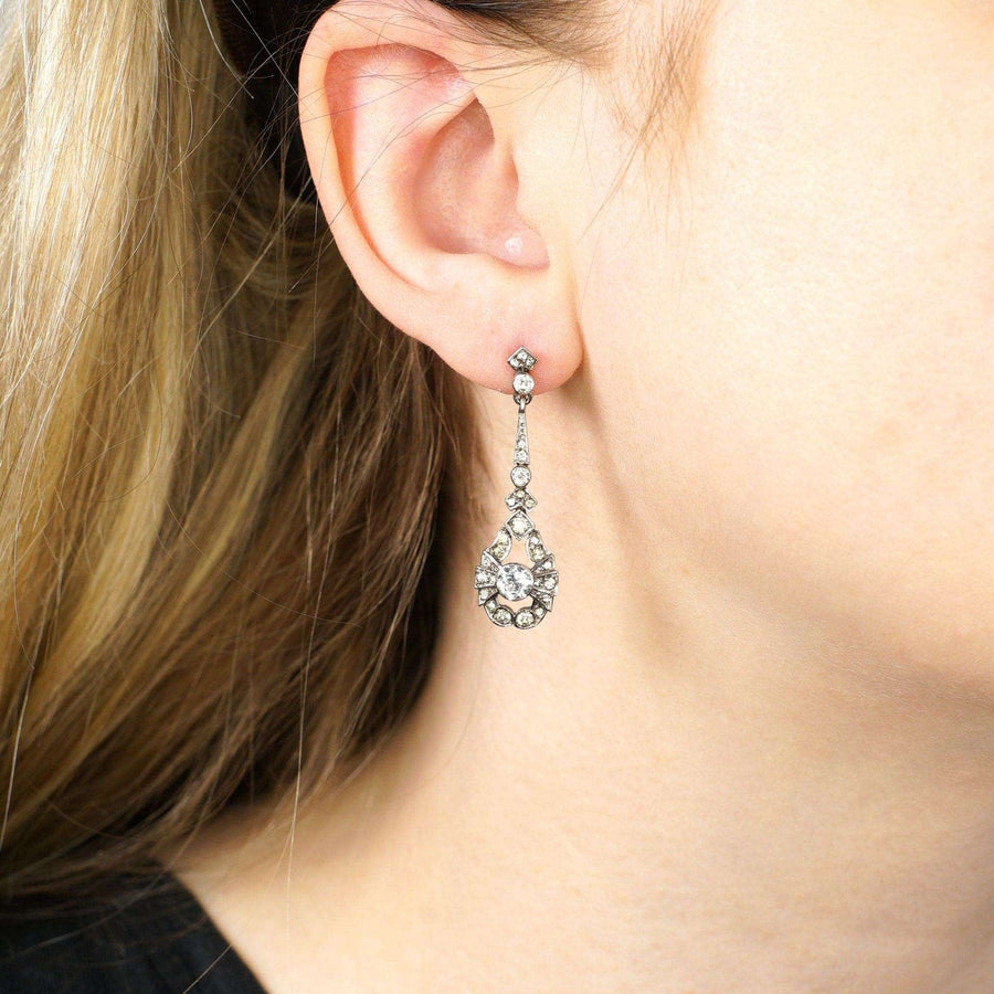 Elegant Art Deco silver earrings with sparkling paste stones, perfect for weddings or formal events.