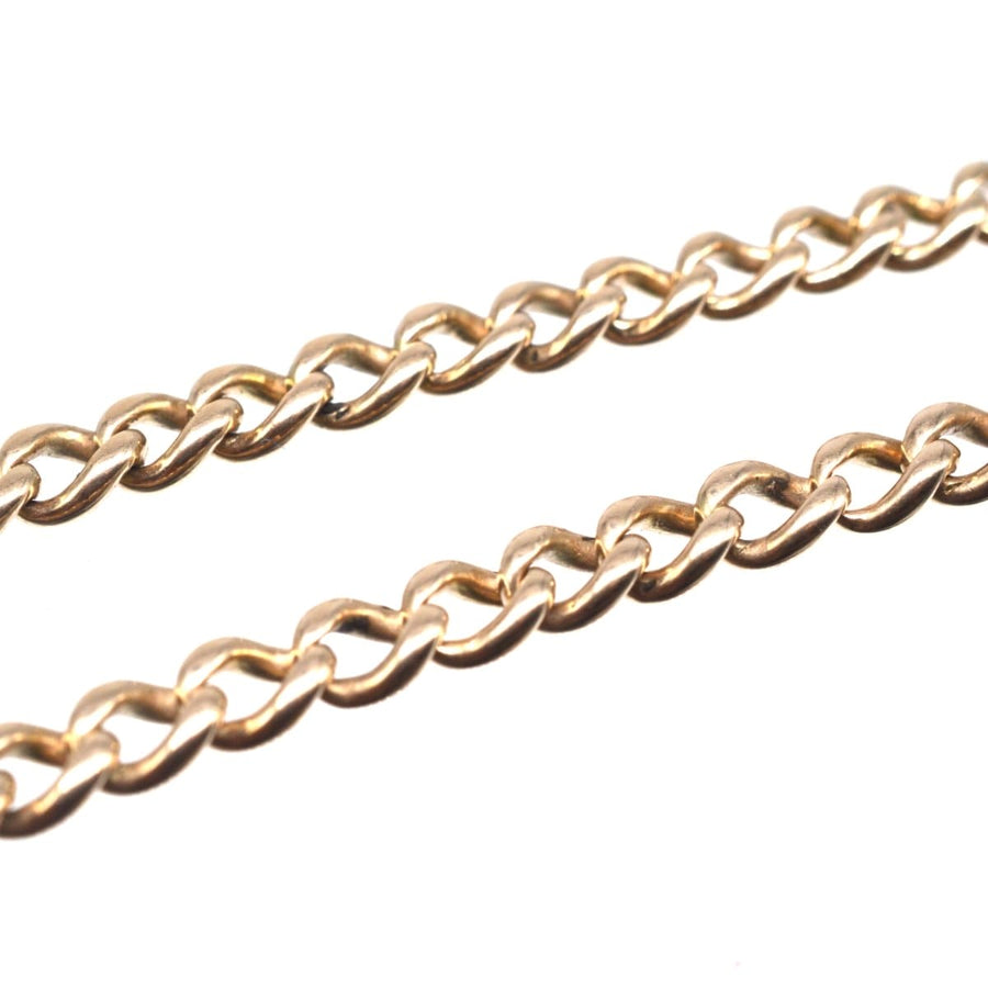 Nahaufnahme einer edwardianischen Albert-Kette aus 15 Karat Gold mit komplizierten Gliedern und Hundeklemmen.