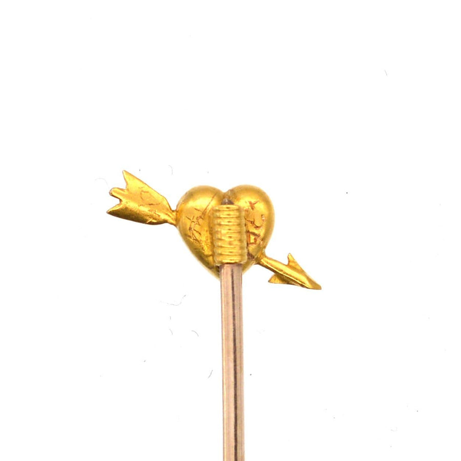 Edwardian 15ct gold heart and arrow tie pin with rose cut diamond, symbolizing love and romance.