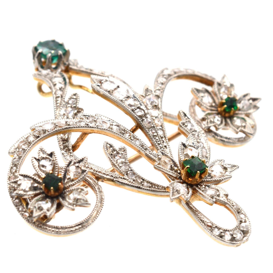 Edwardian gold and platinum brooch with emerald and rose diamond floral design, circa 1900.