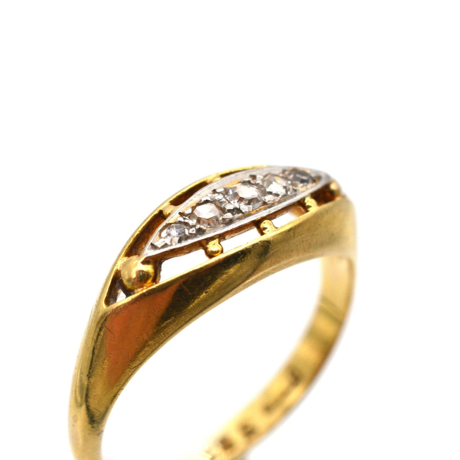 Edwardian 18ct gold and platinum five stone diamond boat shaped ring with old European cut diamonds.