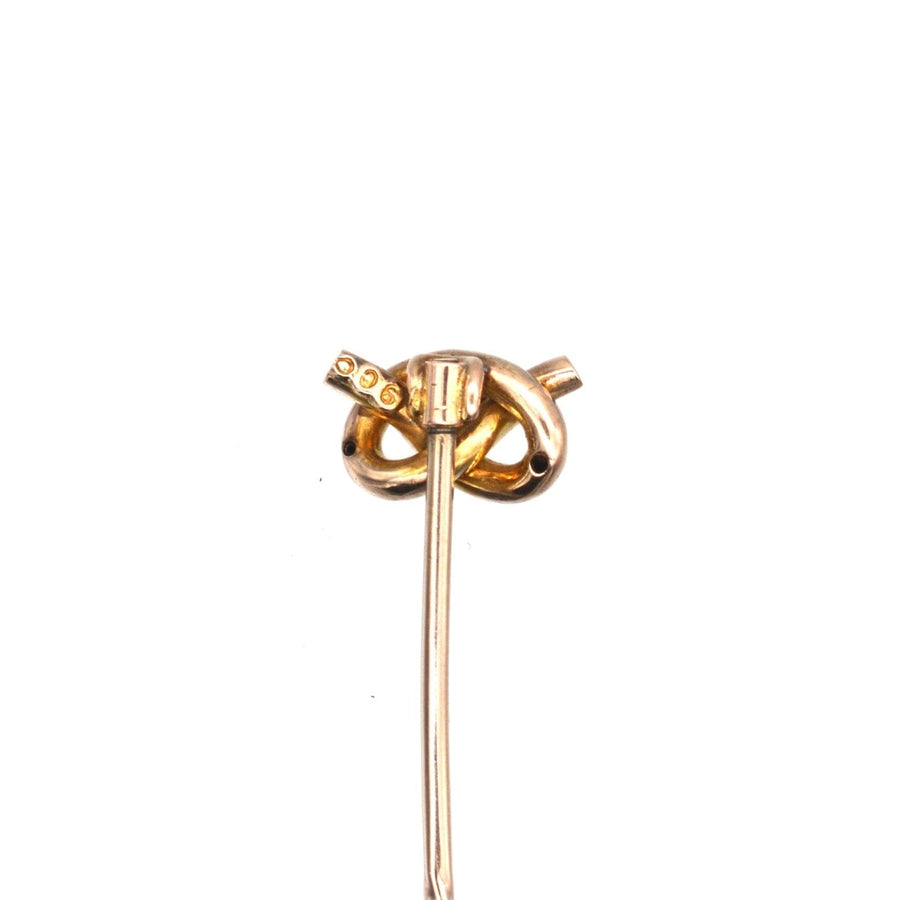 Edwardian 9ct gold lover's knot Krawattennadel mit Aquamarin Mittelstück, ideal für eine stilvolle Seidenkrawatte.