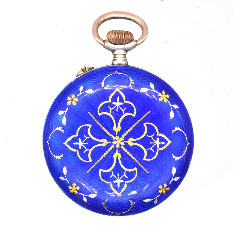 Edwardianische silberne Taschenuhr mit königsblauer Guilloche-Emaillierung und komplizierten goldenen Blumenmustern.