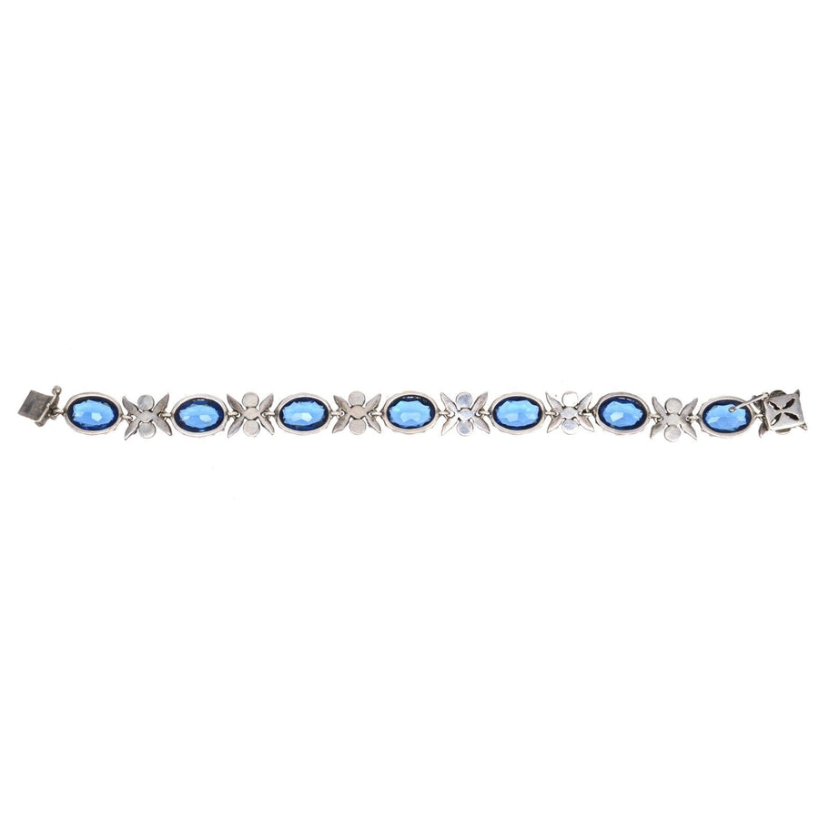 Edwardianisches Silberarmband mit saphirblauen und weißen Strasssteinen in floralen Mustern.