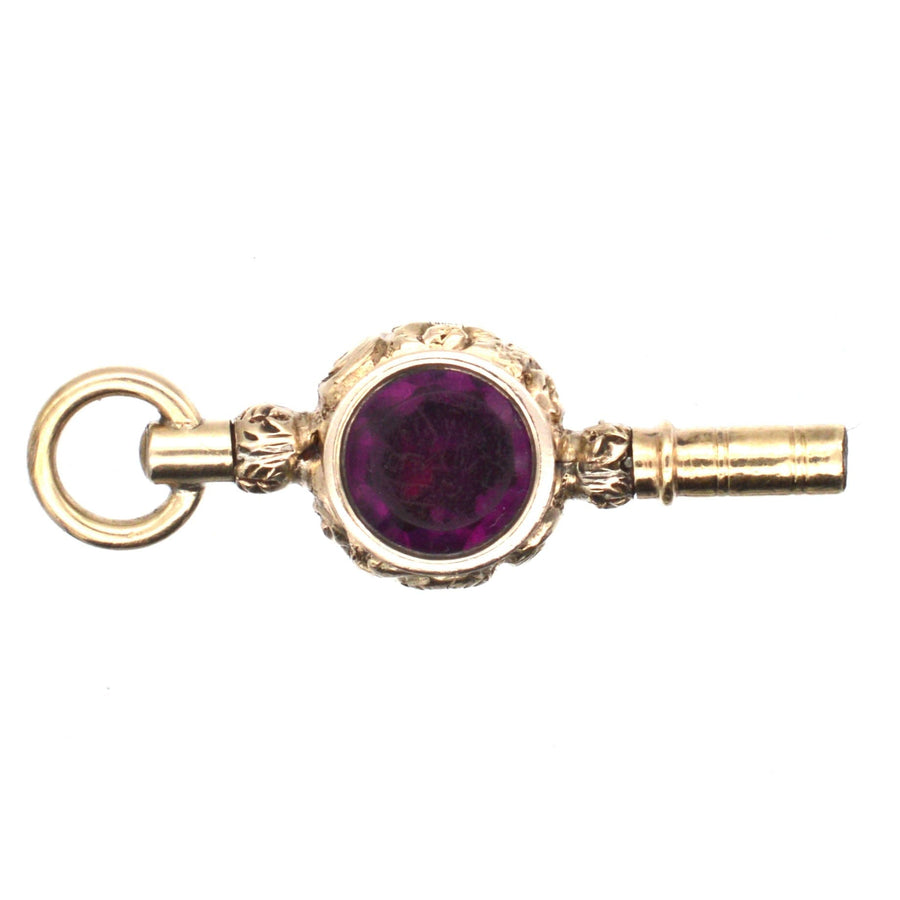 Uhrenschlüssel im Regency-Goldgehäuse mit Amethystpaste, eleganter Vintage-Anhänger aus den 1820er Jahren.