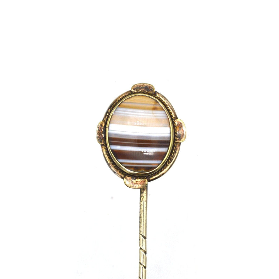 Victorian 9ct gold banded agate tie pin featuring an oval stone with beautiful stripes, ideal for sophisticated attire.