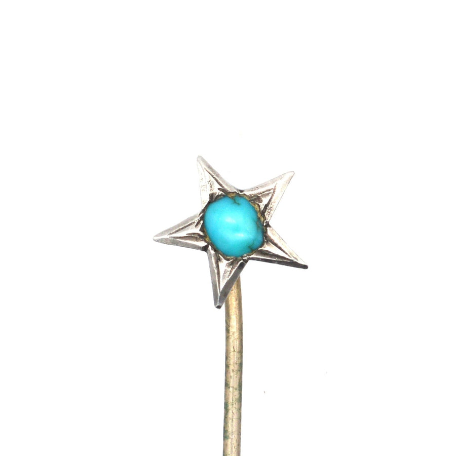 Viktorianische Krawattennadel aus Silber mit einem Sternmuster und einem türkisfarbenen Edelstein in der Mitte, der Liebe und Führung symbolisiert.