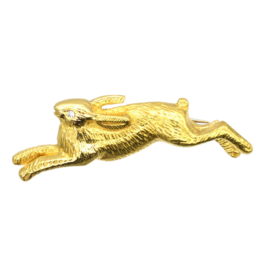 Vintage-Brosche aus 18-karätigem Gold mit einem verspielten, laufenden Kaninchen und einem Diamantauge, hergestellt 1985.