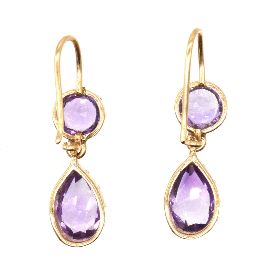 Tropfenohrringe aus 9-karätigem Gold mit lilafarbenen Amethysten in einem hübschen tropfenförmigen Design.
