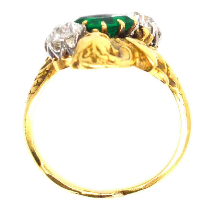 French Art Nouveau 18ct gold griffin ring featuring green Colombian emerald and old European cut diamonds.