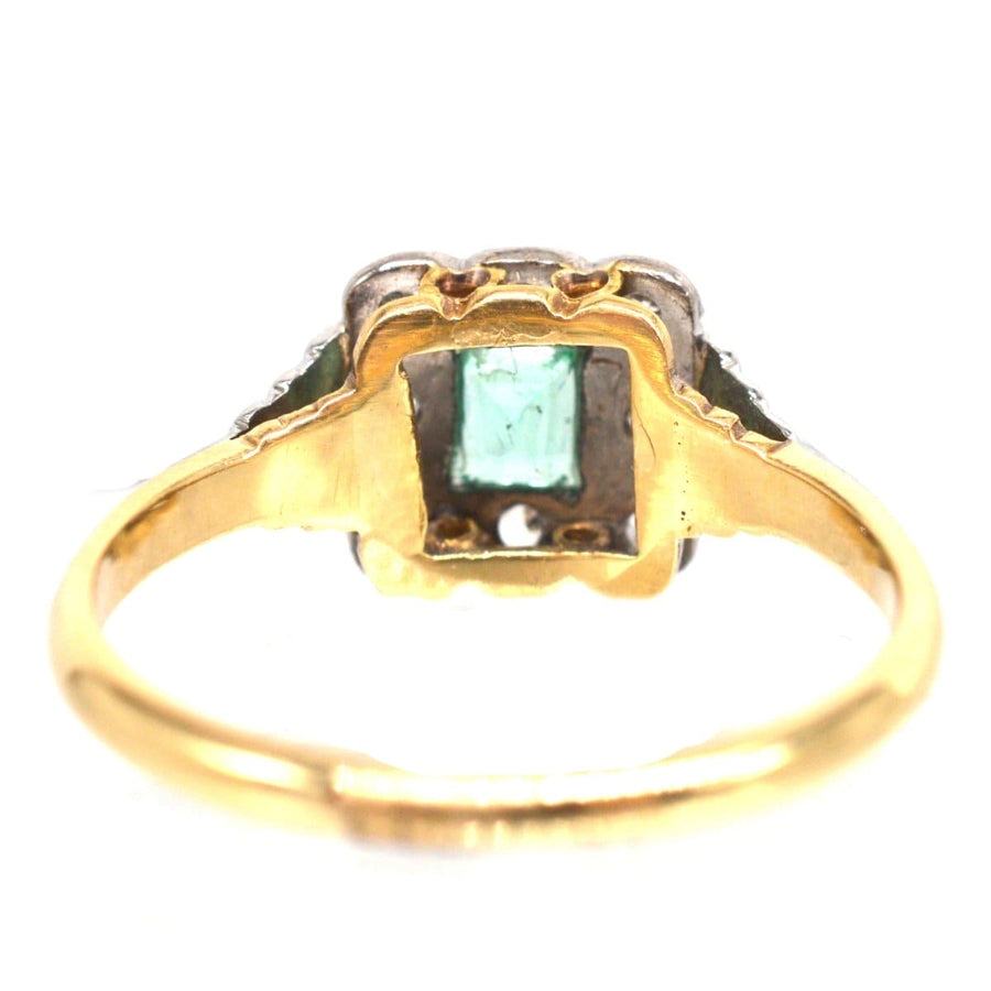Back view of an Art Deco 18ct gold and platinum emerald and diamond ring, featuring a stunning green emerald.