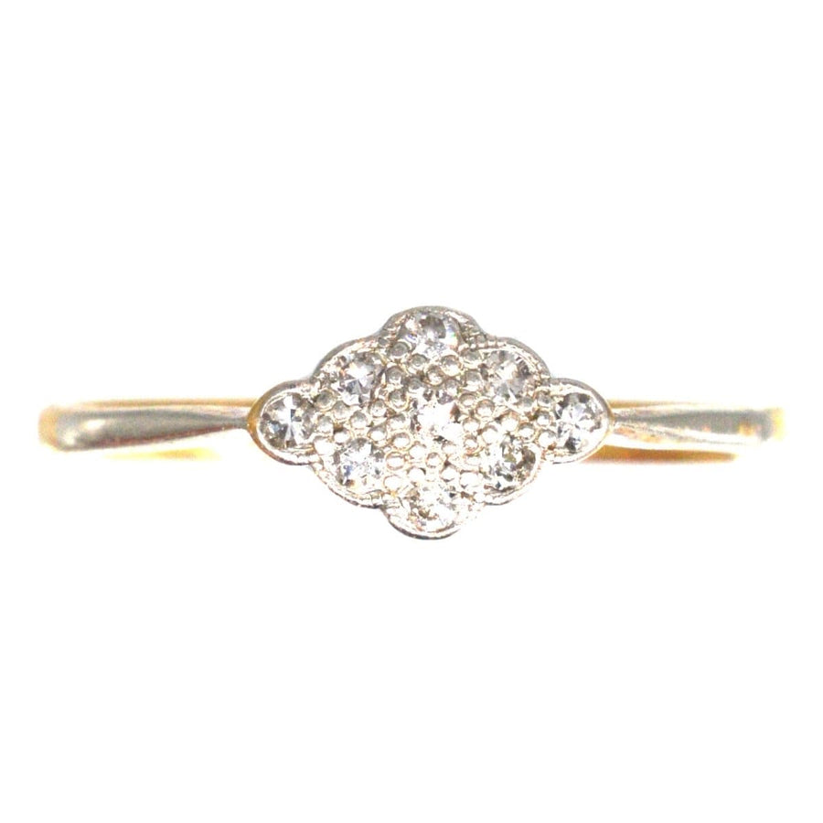 Art Deco 18ct gold diamond cluster ring featuring nine diamonds in an elegant cluster setting, ideal for engagements.