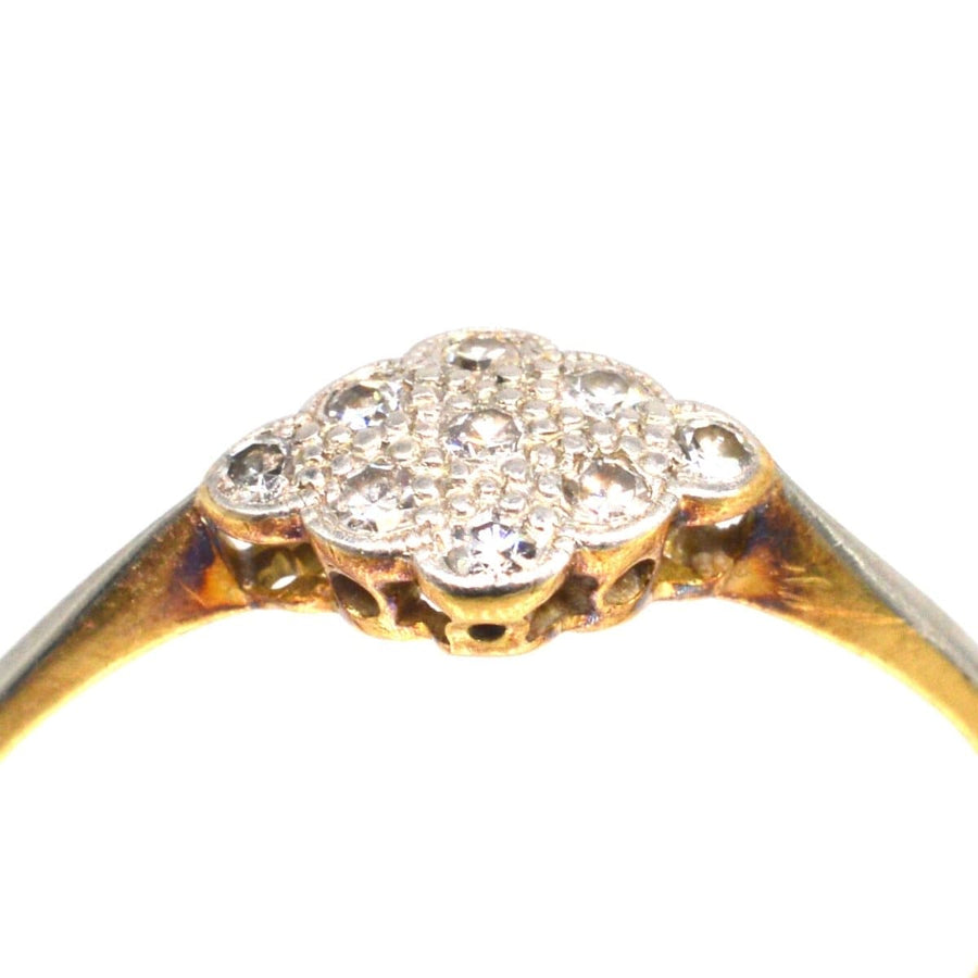 Art Deco 18ct gold diamond cluster ring with nine diamonds in a vintage setting, ideal as an engagement ring.