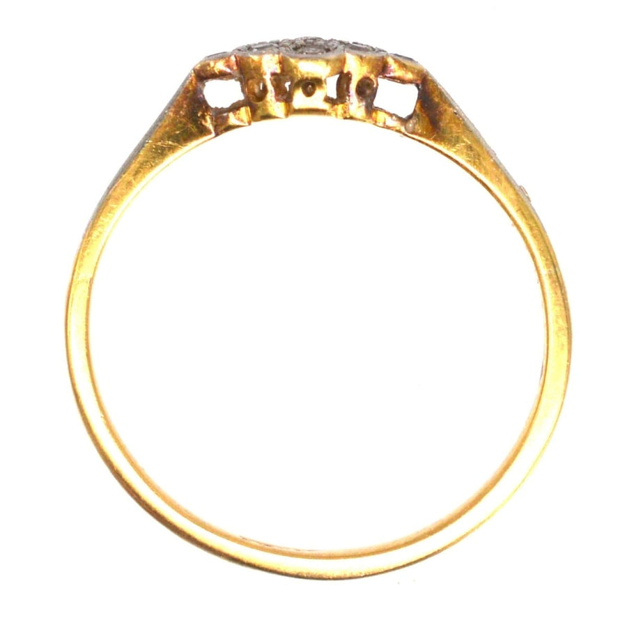 Art Deco 18ct gold diamond cluster ring showcasing a beautiful cluster of nine diamonds in an elegant design.