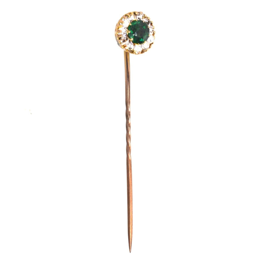 Stylish Art Deco green and white rhinestone cluster tie pin adding elegance to any colorful silk tie.