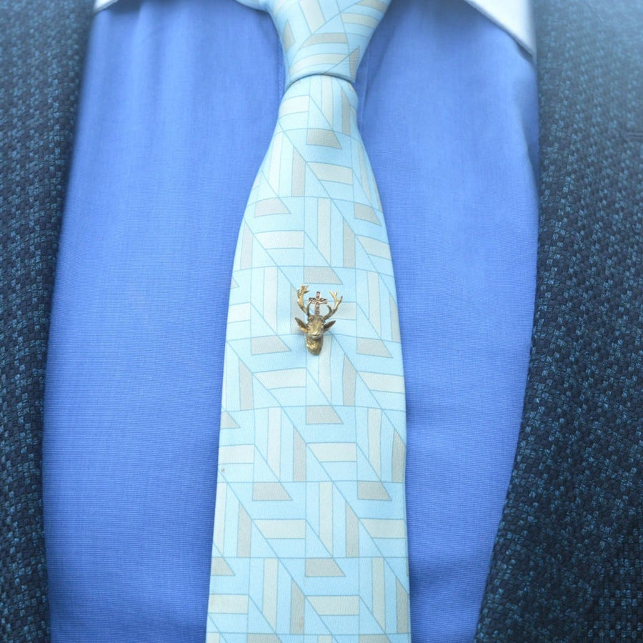 Early 20th century 14ct gold and rose diamond tie pin featuring St. Hubertus stag on a patterned tie.