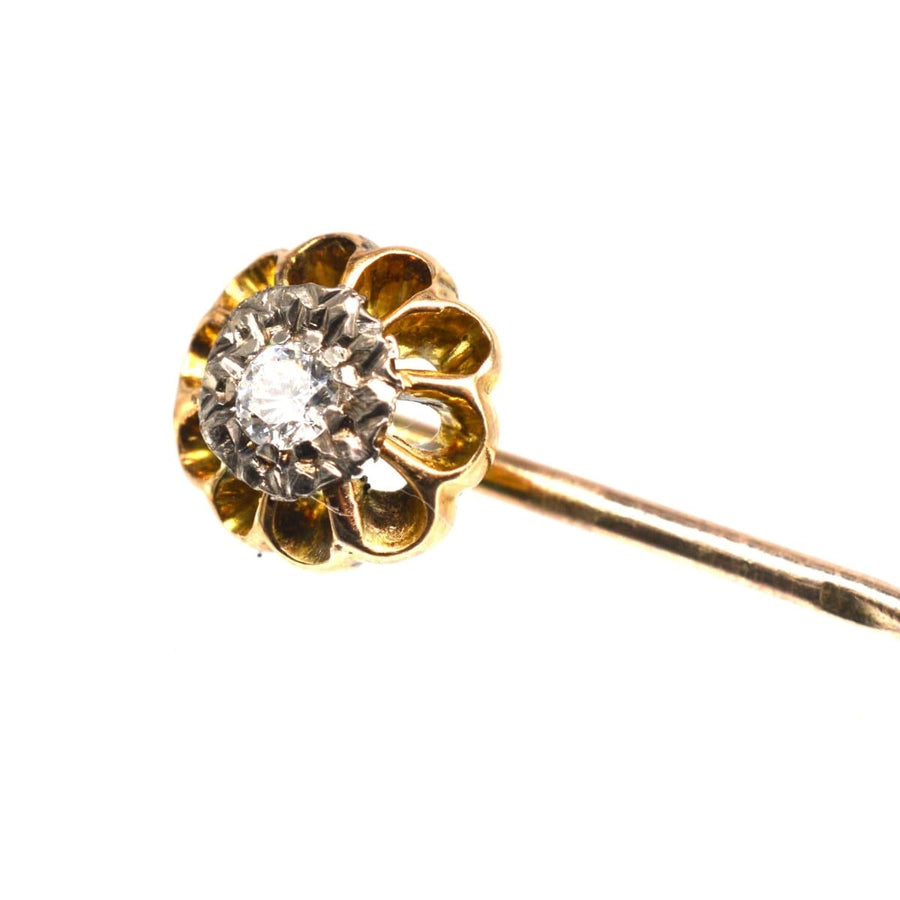 Edwardian 15ct gold and platinum diamond tie pin with claw setting showcasing a brilliant white diamond.