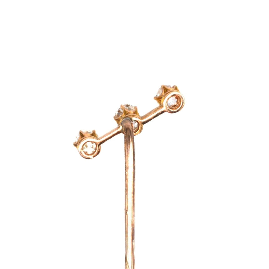 Edwardian 15ct gold three stone diamond tie pin featuring old cut diamonds, perfect for stylish ties.