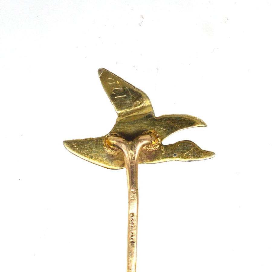 Edwardian 9ct gold duck tie pin, exquisitely detailed with enamel, ideal for enhancing men's formal attire.