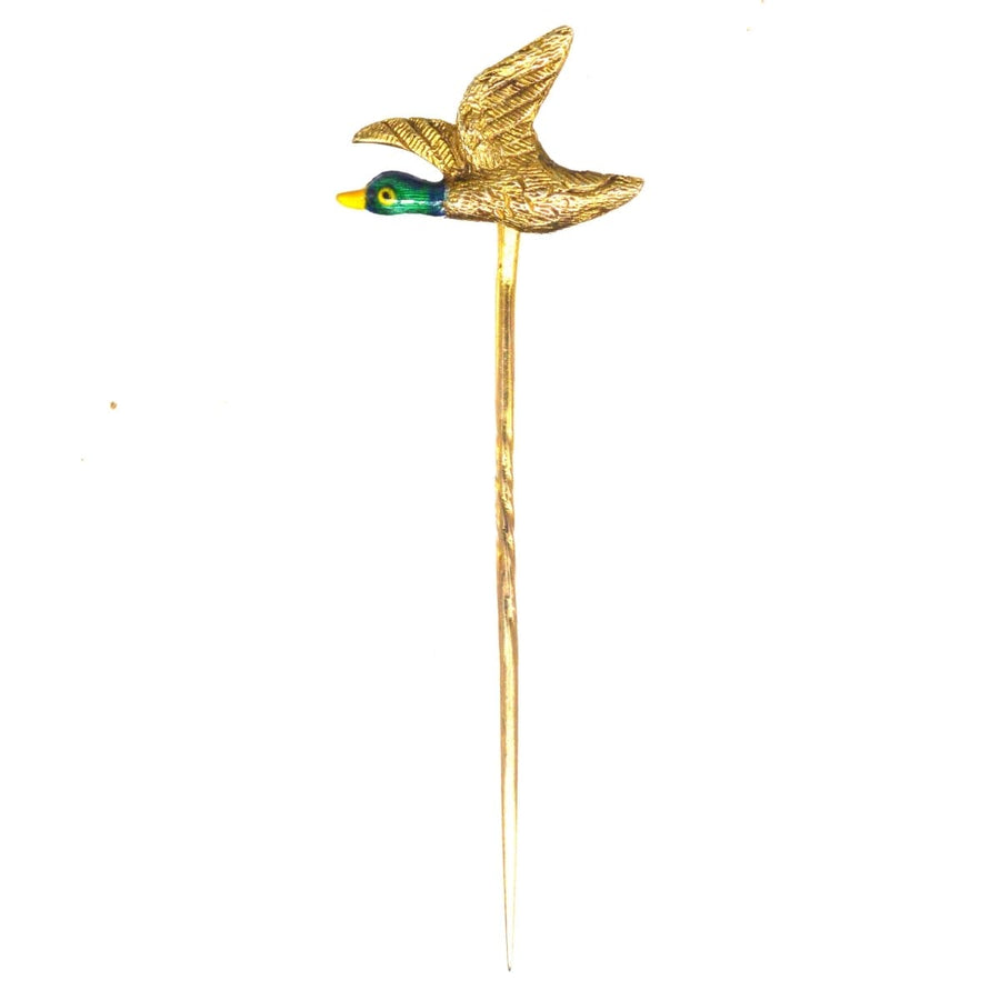 Edwardian 9ct gold and enamel duck tie pin, featuring a lifelike flying duck design, perfect for elegant men's attire.