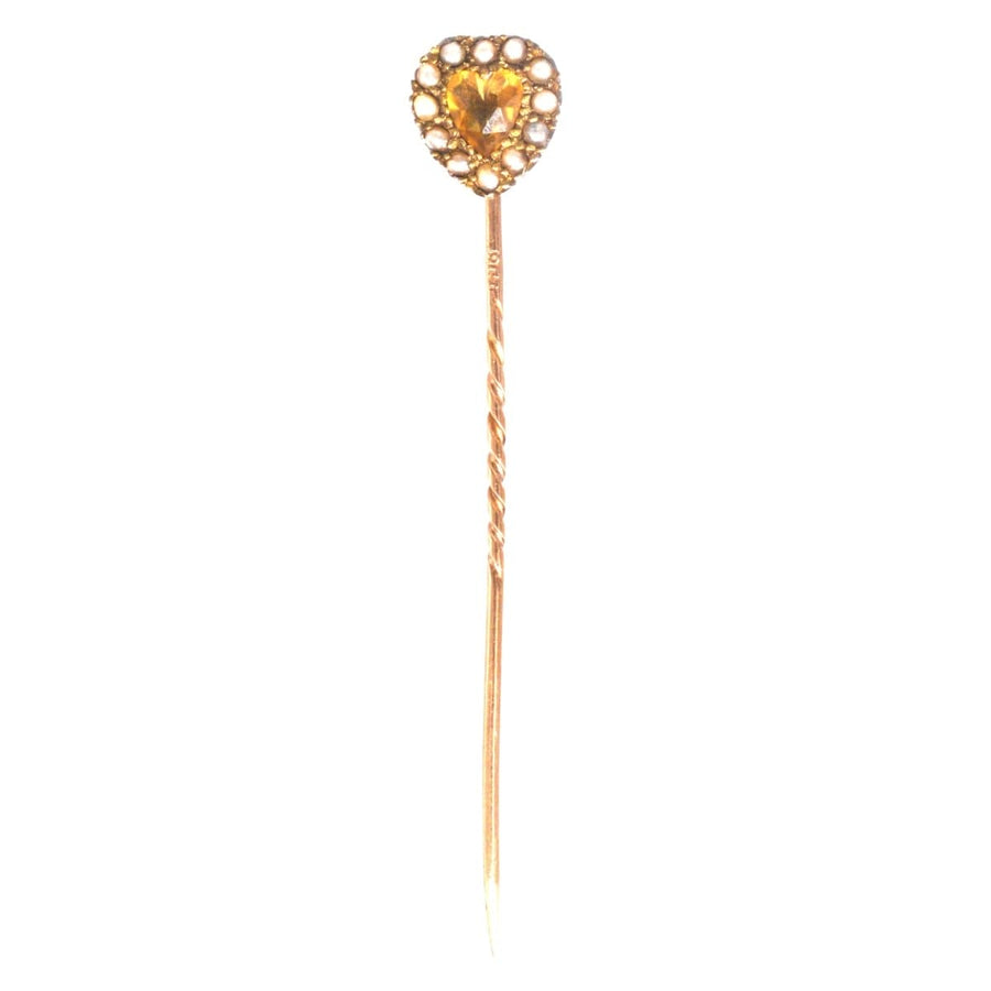 9ct gold heart tie pin featuring a golden citrine gemstone surrounded by seed pearls, perfect gift for loved ones.
