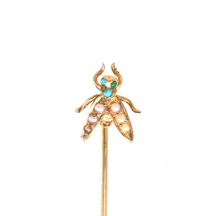 Edwardian 9ct gold bug tie pin with turquoise stones and lustrous seed pearls, perfect for silk ties.