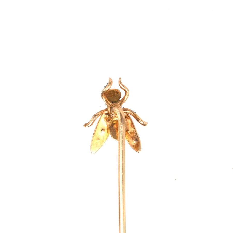 Edwardian 9ct gold tie pin featuring a bug design adorned with turquoise stones and seed pearls, perfect for silk ties.
