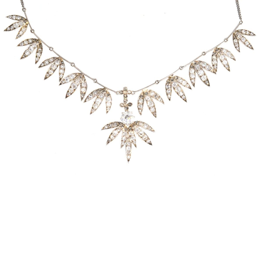 Edwardian silver and platinum necklace with diamond fronds and a stunning 1 carat diamond centerpiece.