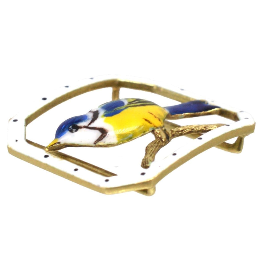 15ct gold enamel buckle featuring a vibrant blue tit bird, symbolizing hope and vitality.
