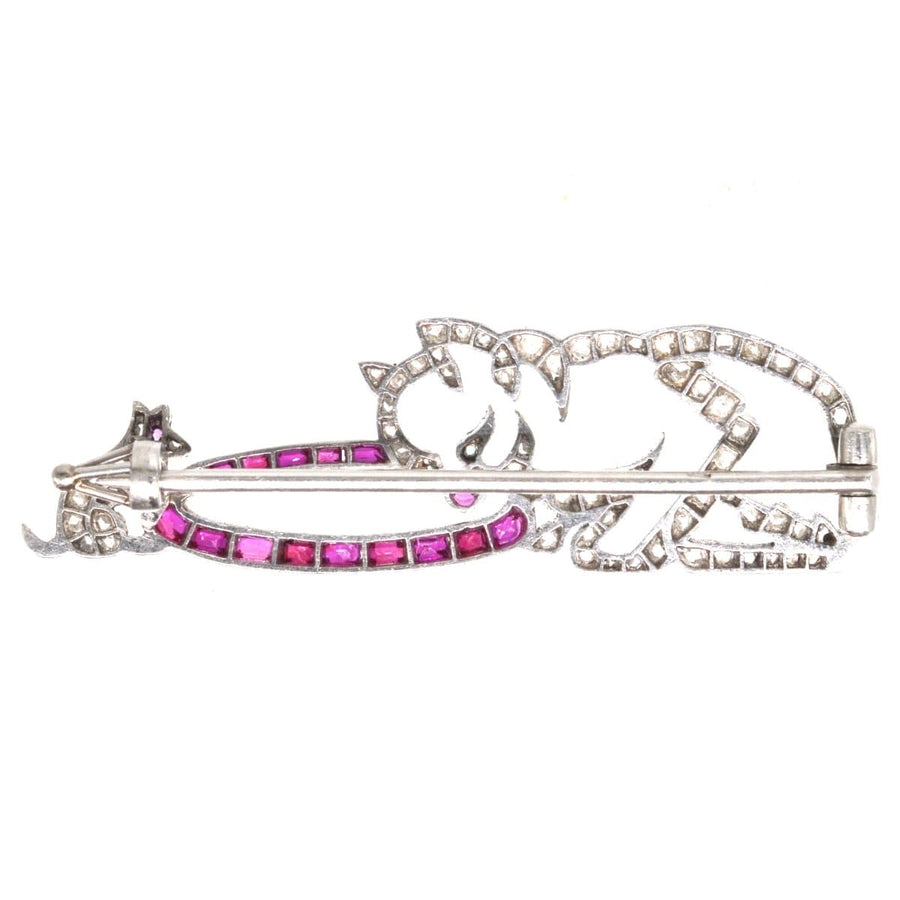 Art Deco brooch featuring a cat and mouse made of rose cut diamonds with ruby accents, perfect for feline enthusiasts.