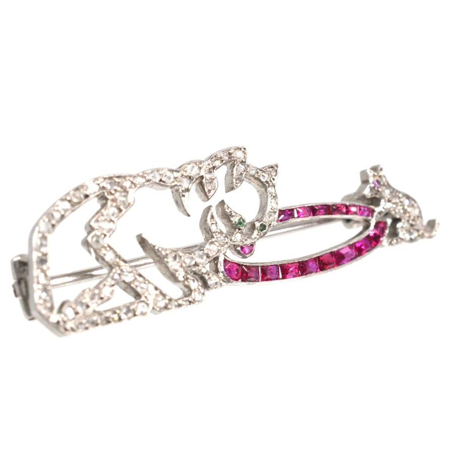 French Art Deco brooch featuring a cat and mouse with rose cut diamonds, rubies, and emeralds in elegant design.