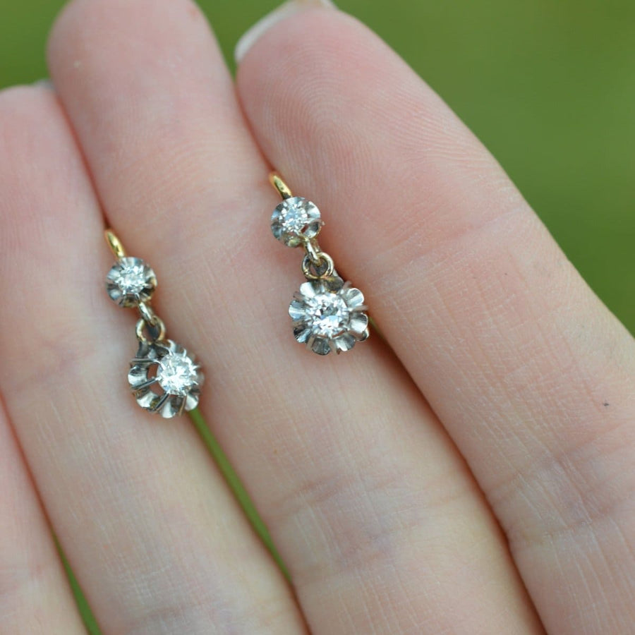 French Belle Epoque 18ct gold and platinum diamond drop Dormeuse earrings with a floral design.