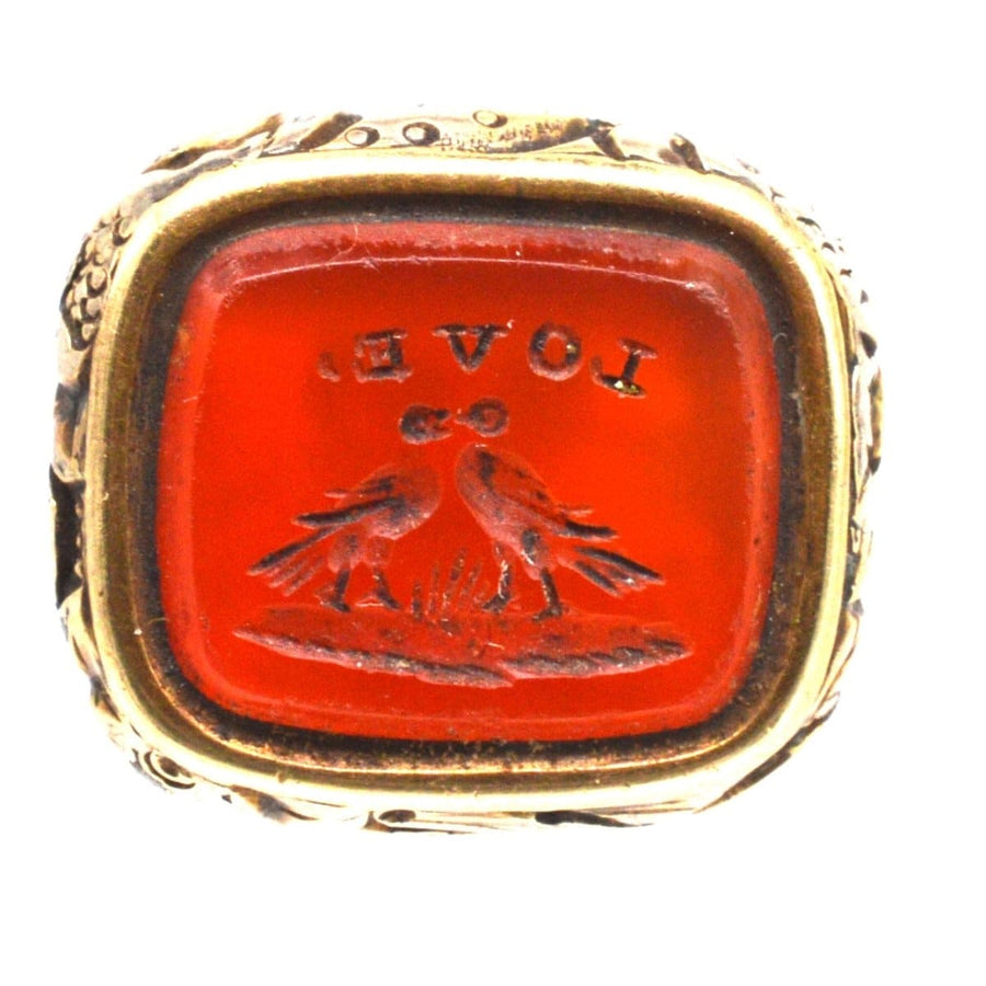 Georgian gold cased seal with carnelian intaglio featuring two doves and the word LOVE, symbolizing everlasting devotion.