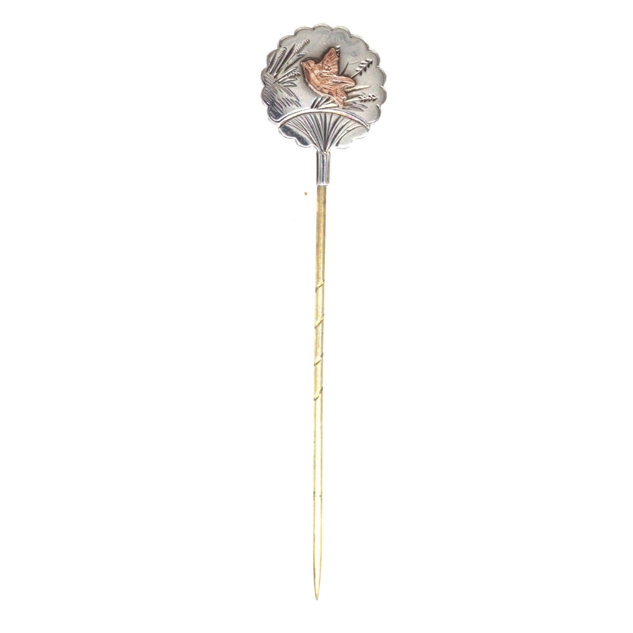Late 19th Century Aesthetic Period bird tie pin featuring a delicate bird design and floral motif.
