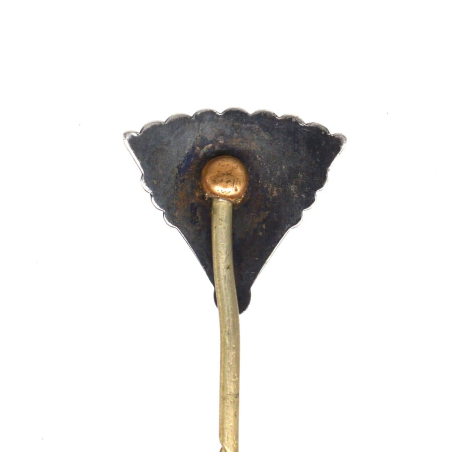 Vintage late 19th century aesthetic period bird fan tie pin with intricate design and gold accent.