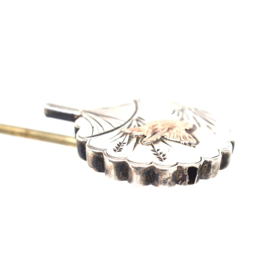Late 19th century Aesthetic period bird tie pin showcasing intricate design and craftsmanship.