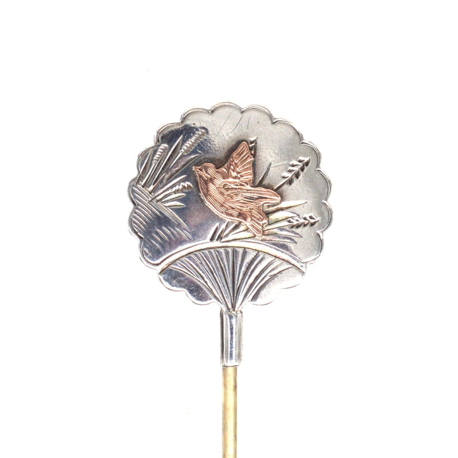 Late 19th century Aesthetic period tie pin with bird and floral design, showcasing intricate craftsmanship.