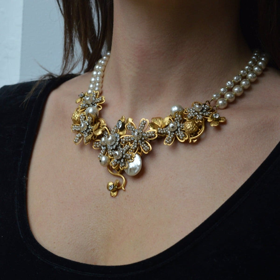 Miriam Haskell signed gold-tone floral necklace with faux pearls, vintage costume jewelry, elegant statement piece.