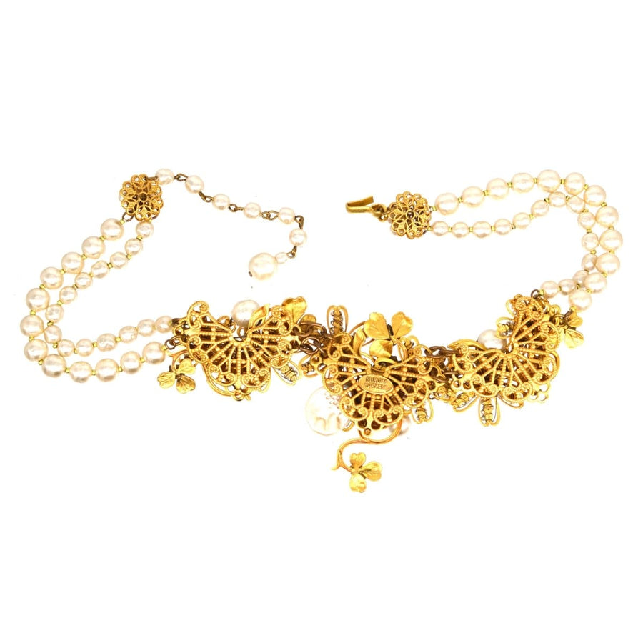 Miriam Haskell signed faux pearl and gold-tone floral necklace, vintage costume jewelry with intricate design.